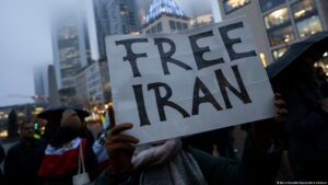 Angry Iranians clash with police over hanging of protesters